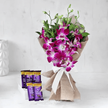 Wonderful 3 Orchids Bouquet with 5 Cadbury Dairy Milk Chocolates