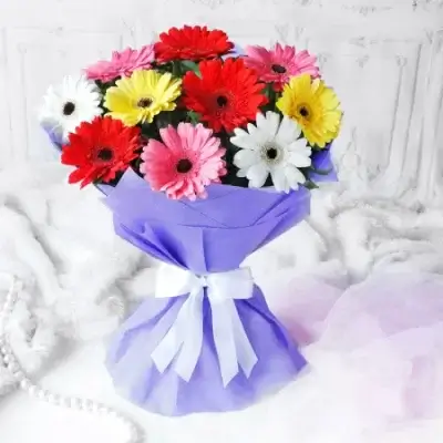 Rakhi with 10 Mixed Gerberas Bouquet